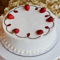 Strawberry Torte · Vanilla sponge cake filled with strawberry mousse, topped with vanilla whipped cream and dec...