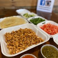 1lb Family Pack · 15 tortillas of choice, choice of 1 protein, 2 cold toppings, 2 salsa selection and lime. 