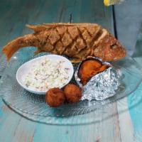 1 Whole Local Snapper · Whole Snapper (head and tail on) - Fish is scored, lightly floured and deep fried
