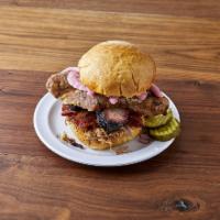 The Woodpile Sandwich · Pulled pork, brisket, sliced sausage and bacon.