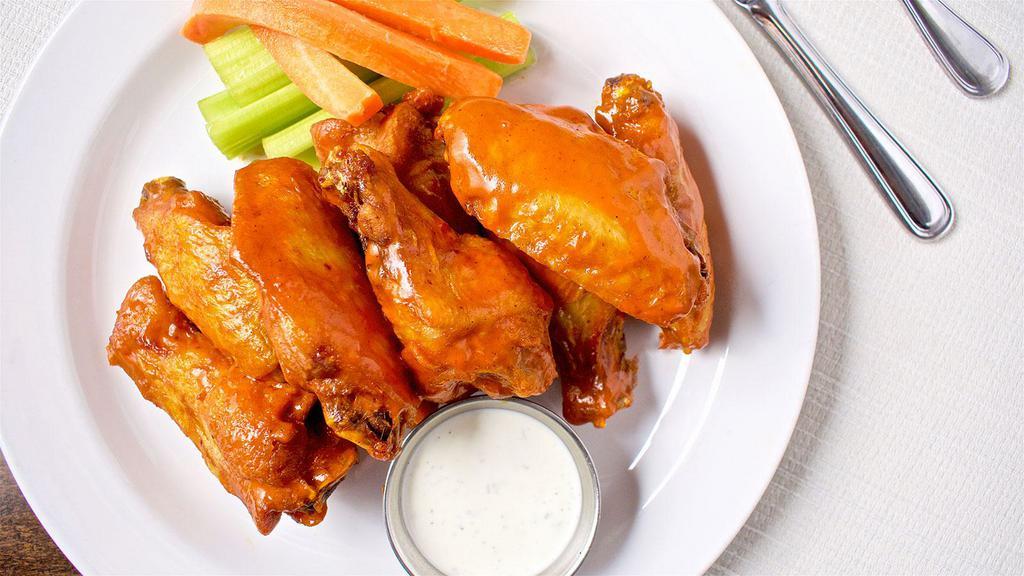 Crispy Wings · Fried wings with sauce choice (tossed or on the side). Comes with carrots/celery and ranch or bleu cheese.