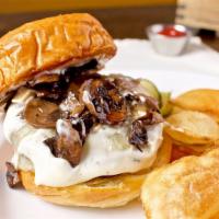 Shroom Luva's  · Zagat's top 15 burgers in the US.  natural beef patty, Sauteed mushrooms, Swiss cheese, shre...