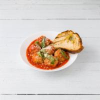 Large Meatball · Beef and pork meatballs with tomato sauce, Parmesan cheese, basil and crostini.