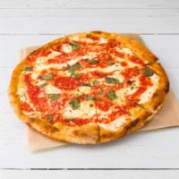 PIZZA MARGHERITA · Mozzarella cheese, basil and tomato sauce.