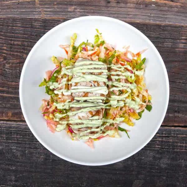 Hija De La Tostada · Seared Mahi Mahi Served over Homemade Mexican Coleslaw, Romaine Lettuce, and Corn, Served on Crispy Tostada Shells Spread With Refried Black Beans, Tossed in Epazote Cilantro Dressing and Topped With Epazote Aioli and Arbol Chile Oil