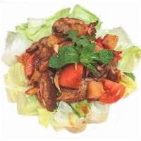 Crispy Duck Salad · Hot and spicy. Fried sliced duck, red onion, cilantro, scallion, cucumber bell pepper and pi...