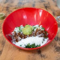 Carne Asada Bowl · Carne Asada, sauteed kale, black bean, rice, roasted tomatillo salsa, guacamole, onions, cil...