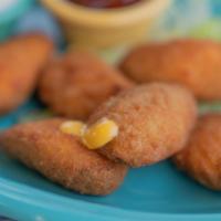 Jalapeno Poppers · Golden crispy jalapeno stuffed with cheese.