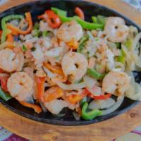 Fajita de Camarones · Shrimp fajita.
NOTE: Plate comes with rice, beans, salad, sour cream and guacamole