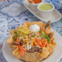 Fajita Salad · Made with grilled peppers, onions and choice of steak, chicken, pork, chorizo.
Comes with le...