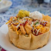 Chipotle Chicken Salad · Chicken tossed in our own spicy chipotle sauce.
Comes with lettuce, beans, shredded cheese, ...