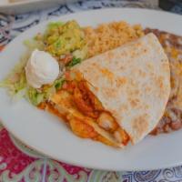Shrimp Quesadilla · Quesadilla made with sautéed shrimp in sauce. NOTE: Plate comes with rice, beans, salad, sou...