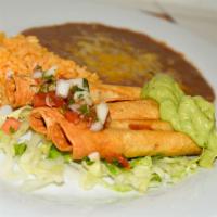 Taquitos · 3 rolled taquitos made with chicken, pork or beef.        NOTE: Plate comes with rice, beans...