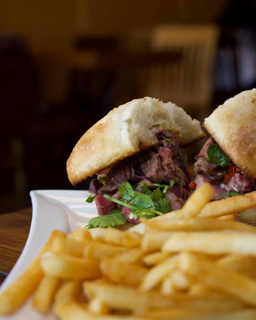 Steve's Steak Sandwich · Our most popular sandwich! usda prime beef, grilled medium rare, thinly sliced and loaded onto a torta, topped with a spicy peruvian coarsely cut chimichurri sauce.
