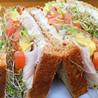 Sacks Symphony Sandwich · Turkey breast, bacon, avocado, tomato, alfalfa sprouts, cream cheese, mayo, on 12-grain bread.