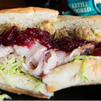 Sacks Improv Sandwich · Turkey breast, herb stuffing, cranberry sauce, shredded lettuce, mayo, on an 8 inch baguette.