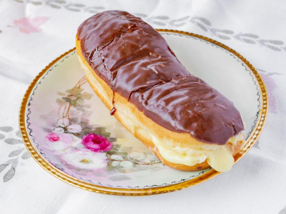 Eclair · a delicious oblong pastry filled with custard and topped with yummy chocolate.