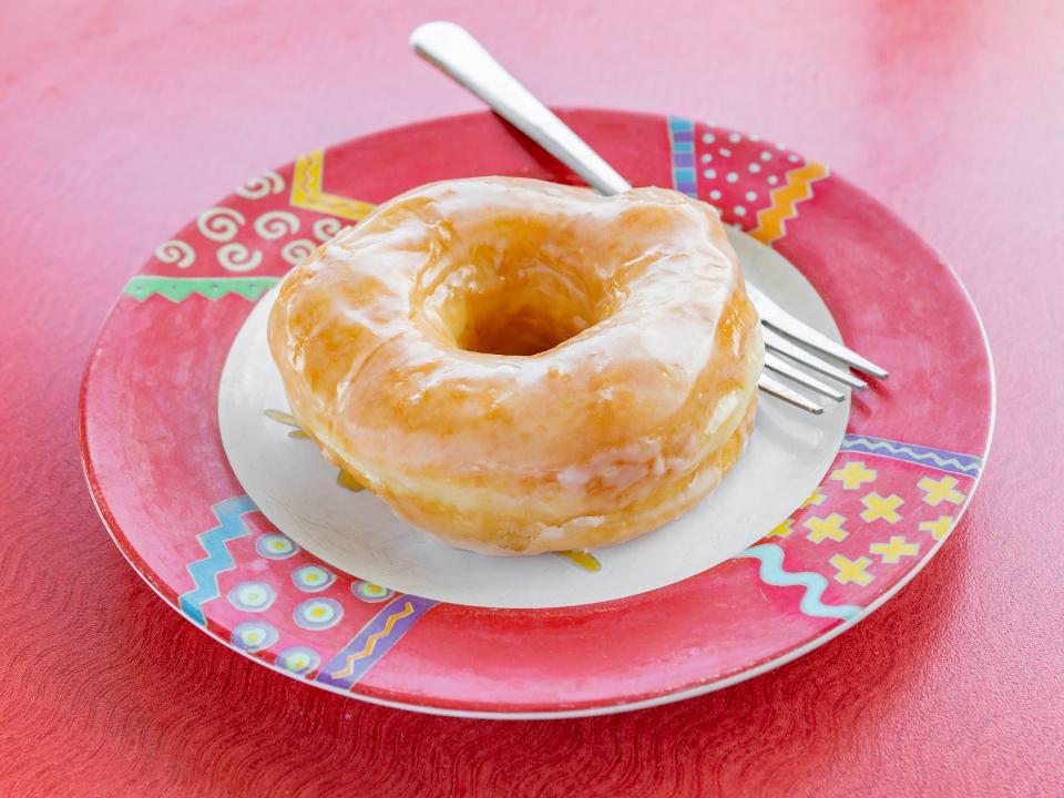 Single Glazed Donut · a melt in your mouth Homemade Glazed Donut that is fluffy with a perfectly sweet glaze. They come together so easily and will be your favorite hands down.