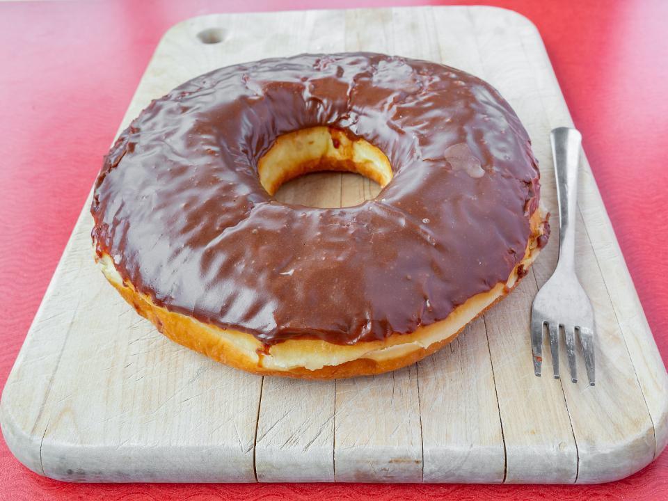 Texas Donut · Choose on of our Texas sized Donuts either Glazed or Chocolate Covered with Candy Beads or Plain Chocolate Covered.