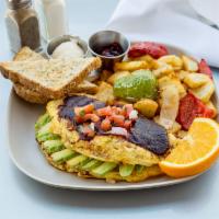 Southwestern Omelet · Black beans, roasted corn, tomatoes, avocado, hatch green chiles and cheddar cheese topped w...