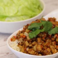 Lettuce Wrap · Sauteed soy protein, shiitake mushroom, jicama, and carrots. Vegan.