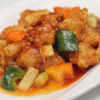 Sweet and Sour Chicken · Soy protein, fried mushroom, pineapples, bell peppers, and cucumber. 