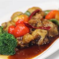 General Tso Chicken · Soy protein, fried mushroom, broccoli, red, and green bell peppers.