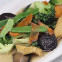 Veggie Delight · Broccoli, carrots, fried tofu, mushrooms, and snow peas. Vegetarian. Vegan. Gluten-free.