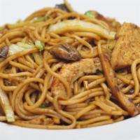 Kung Fu Noodle · Wheat noodles, soy-ham, napa cabbage, soy-shrimps, tofu, mushrooms, and carrots. Vegan.