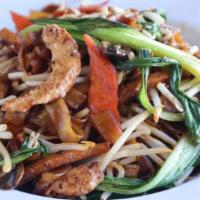 Stir Fried Flat Noodle · Flat rice noodle, bean sprout, soy-ham, soy-shrimp, carrot, bok choy, and mushrooms. Vegan.