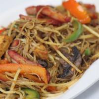 Singapore Fried Rice Noodle · Rice noodle, bean sprout, soy-BBQ pork, soy-shrimp, mushroom, bell pepper, and curry powder....