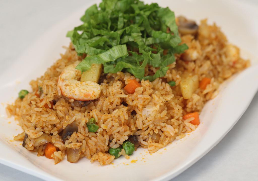 Tom Yam Fried Rice · Fried rice, mushroom, green bean, carrot, corn, soy shrimp, and tom yam paste. Vegan. Gluten-free.