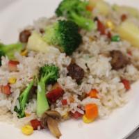 Hawaiian Fried Rice · Fried rice, pineapple, mushroom, soy-BBQ pork, broccoli, green bean, carrot, and corn. Vegan...
