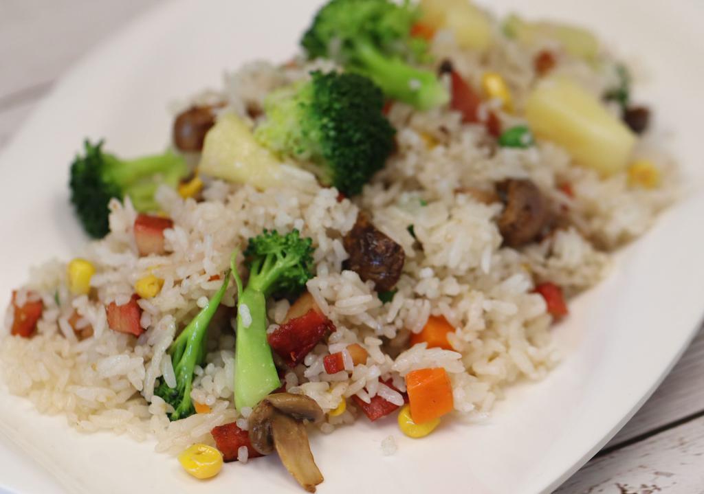 Hawaiian Fried Rice · Fried rice, pineapple, mushroom, soy-BBQ pork, broccoli, green bean, carrot, and corn. Vegan. Gluten-free.