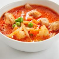 Massaman Curry · Chicken, Potatoes, Onions, Carrots and Peas.  Contains some peanuts