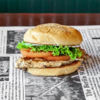 Chicken Sandwich · Char-broiled chicken breast, mayonnaise, lettuce, tomato, and pickles.