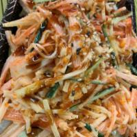 Spicy Kani salad  · Crabsticks, sliced cucumber, masago, crunchy flake, spicy mayo mixed with eel sauce and
sesa...