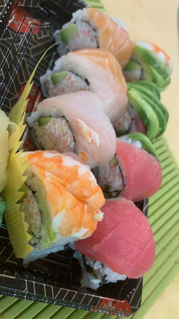 Rainbow roll · avocado, cucumber. mixed snow crabmeat, topped with assorted 4 kinds of fish and avocado
