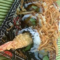 Super Crunchy roll · Tempura shrimp, avocado , crabstick .topped with crunchy flake ,potato flake and eel sauce
