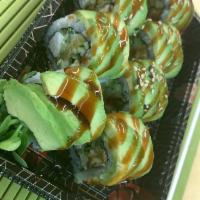 Caterpillar roll · BBQ eel , cucumber ,cream cheese topped with sliced avocado, sesame seeds, eel sauce