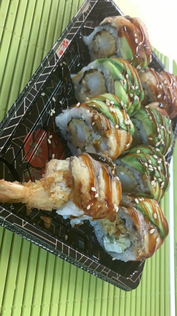  Black Dragon roll  · Tempura shrimp, cream cheese, cucumber inside, topped with BBQ eel , avocado ,eel sauce
,sesame seeds