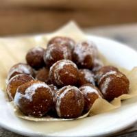 Apple Cider Donut Holes · Like you’re at the State Fair! 20 warm, light and perfectly crisp
donut holes tossed in swee...