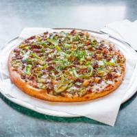 Mexican Style Pizza · Carne asada, chorizo, beans, cheese, cilantro, jalapenos, bell peppers, onions, and tomato.