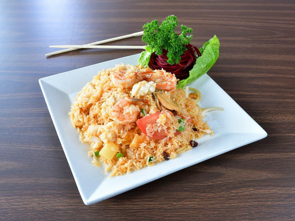 #28. Seafood Fried Rice · Combo seafood with pineapples, cashew nuts, onion, raisins, tomatoes, and bean sprouts.