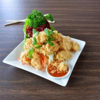 #8. Crispy Calamari · Deep-fried calamari served with sweet and sauce.