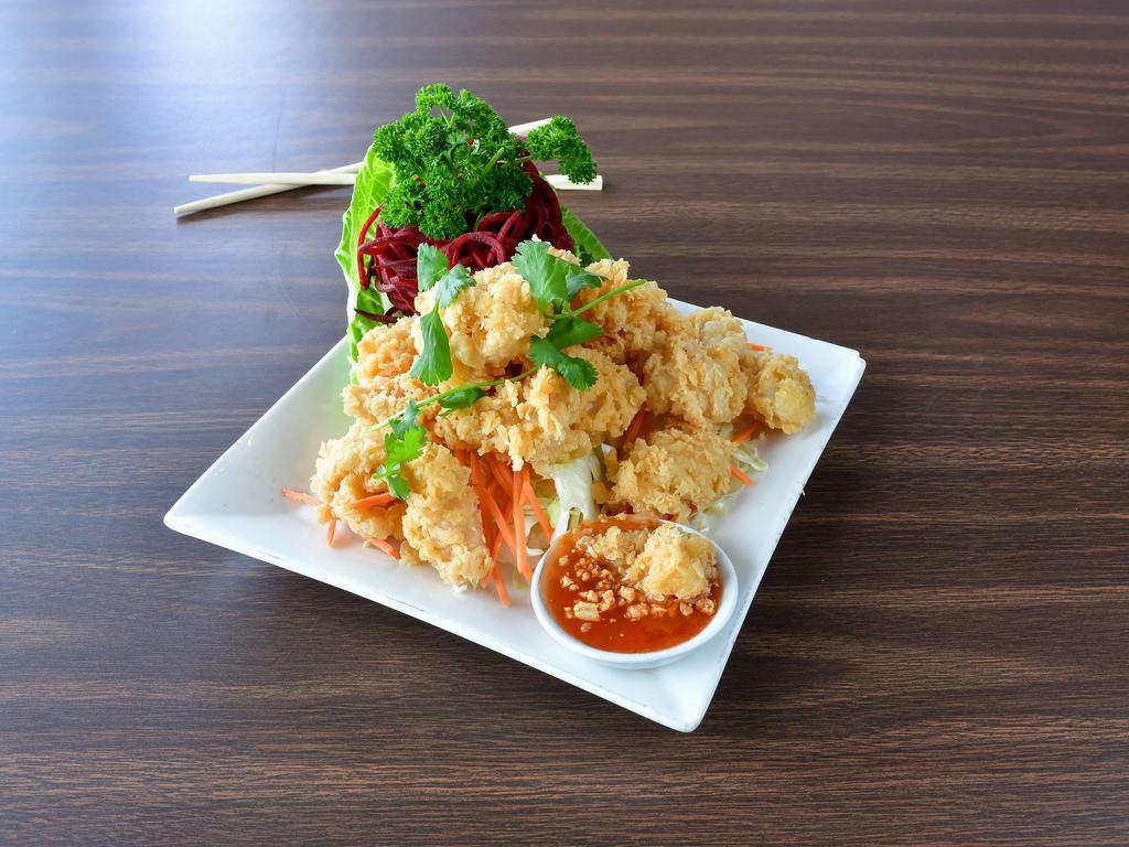 #8. Crispy Calamari · Deep-fried calamari served with sweet and sauce.