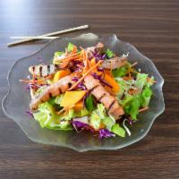 #13. Salmon Salad · Fresh greens salad top with grilled salmon, mangoes and lime dressing.