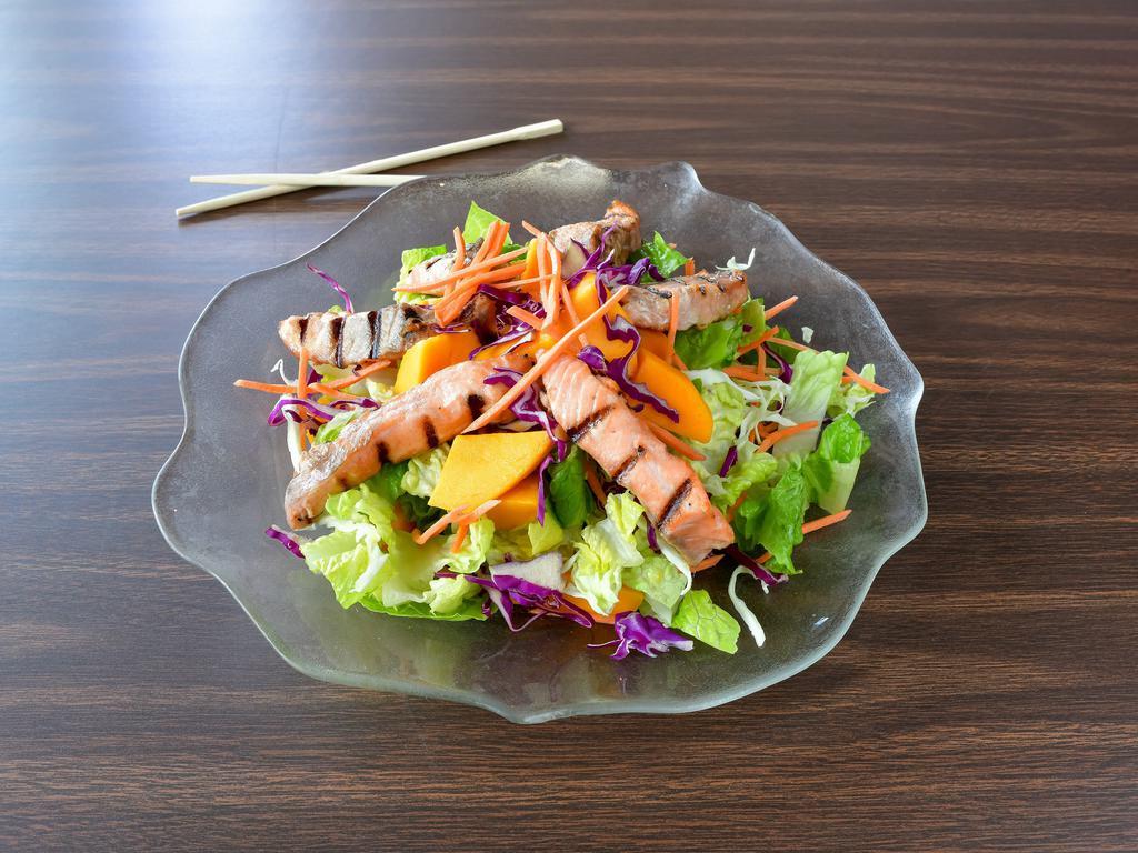 #13. Salmon Salad · Fresh greens salad top with grilled salmon, mangoes and lime dressing.