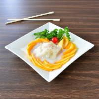 #1. Sweet Sticky Rice with Mangoes · Served with coconut ice cream.