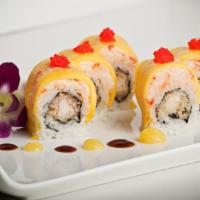 Golden Dragon Roll · Two pieces of shrimp tempura with avocado, topped with lobster salad and thinly sliced golde...